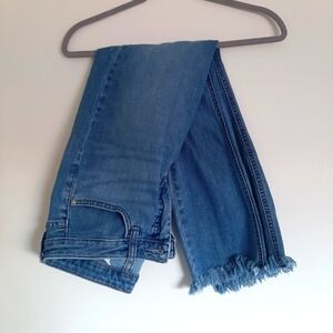 Classic Lee's blue jeans with chewed hem